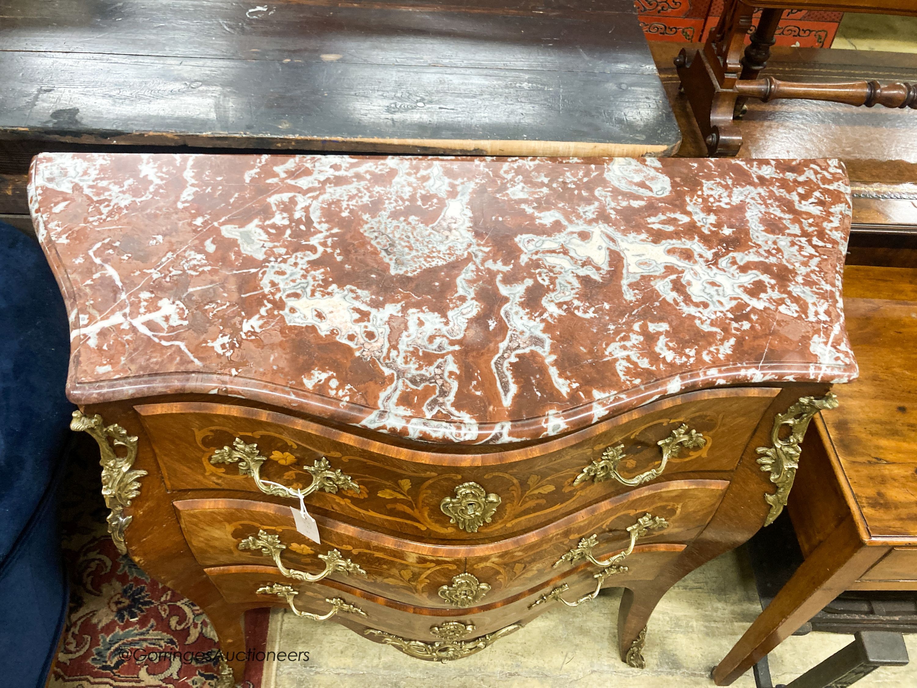 A Louis XV style marquetry inlaid marble top bombe commode, W.110cm D.45cm H.100cm